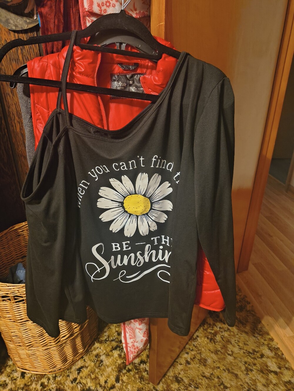 Women’s Black Long-Sleeve Graphic Top with Daisy Print